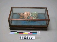 藏品(側臥哺乳交趾陶)的圖片